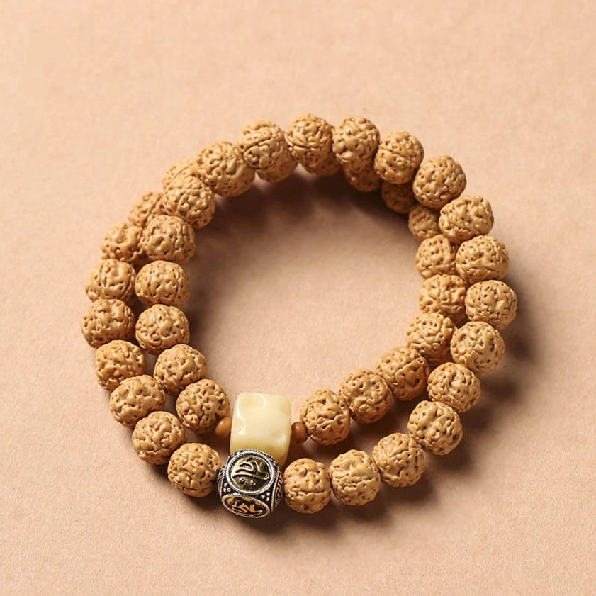 Natural bodhi seed Buddhist bracelet with three-eye protective Dzi bead and wrapped accent details