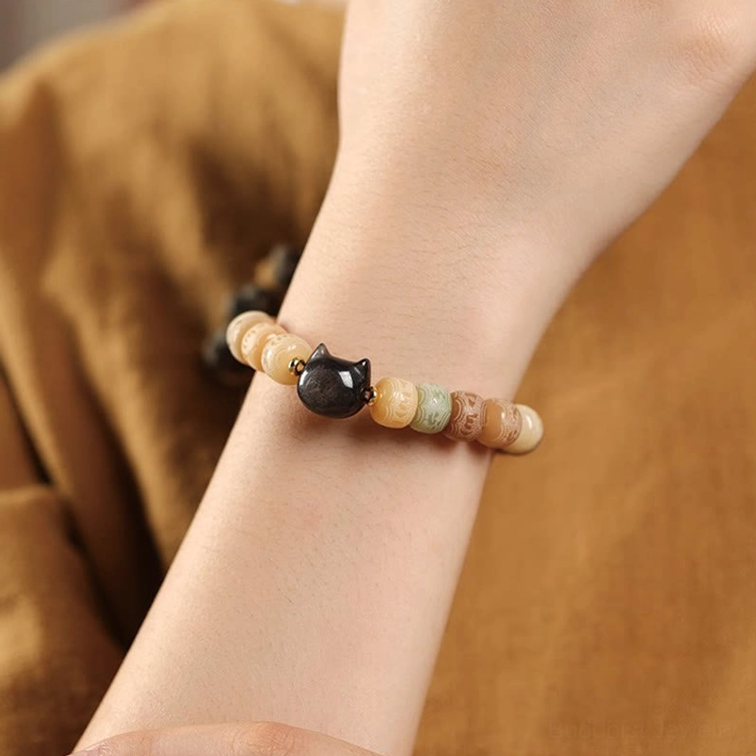 Bodhi seed Om Mani Padme Hum bracelet worn on wrist showing everyday casual wearing comfort and style