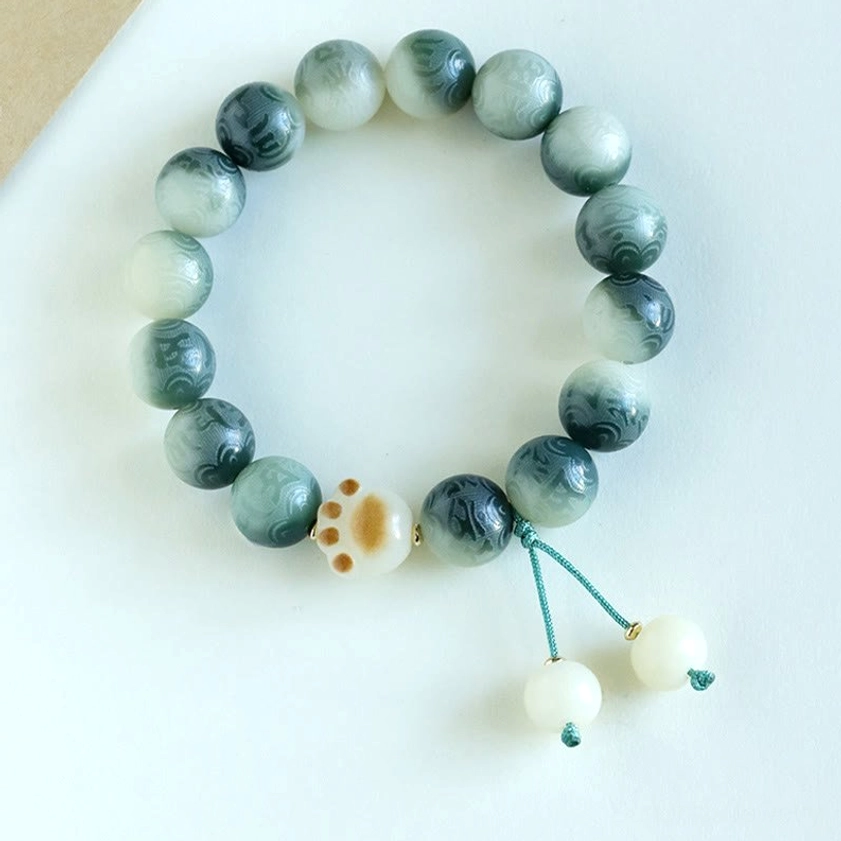 Bodhi Seed Om Mani Padme Hum Buddhist bracelet lifestyle wear on wrist against natural background