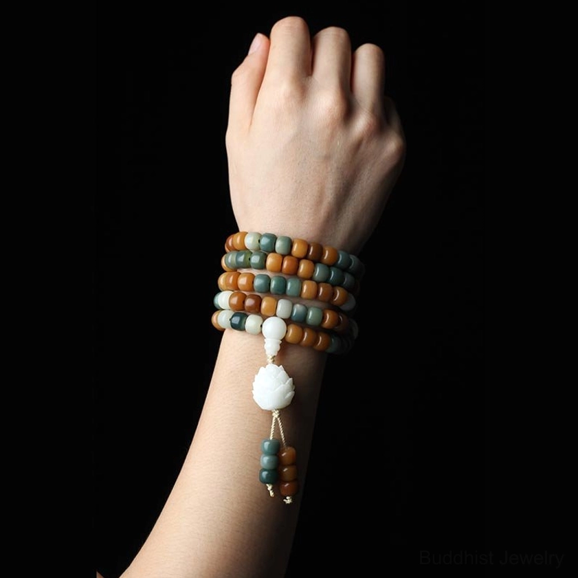 Bodhi bead wrap bracelet stacked on forearm wrist showing mixed color natural beads