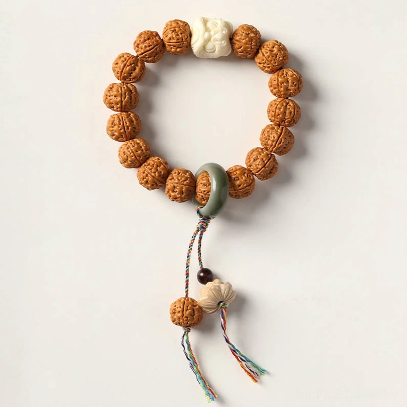 Bodhi seed Buddhist bracelet with three-eye Dzi bead and lion pattern accents for spiritual strength