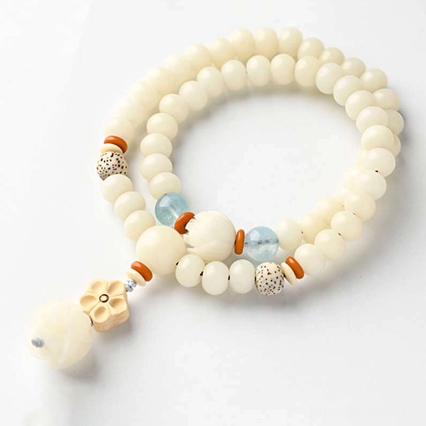 Single-loop bodhi lotus blessing bracelet on white background showing complete design
