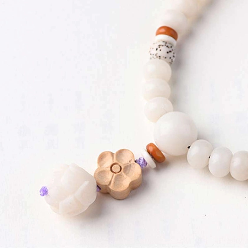 Spiritual bodhi lotus blessing bracelet in natural light showing authentic colors