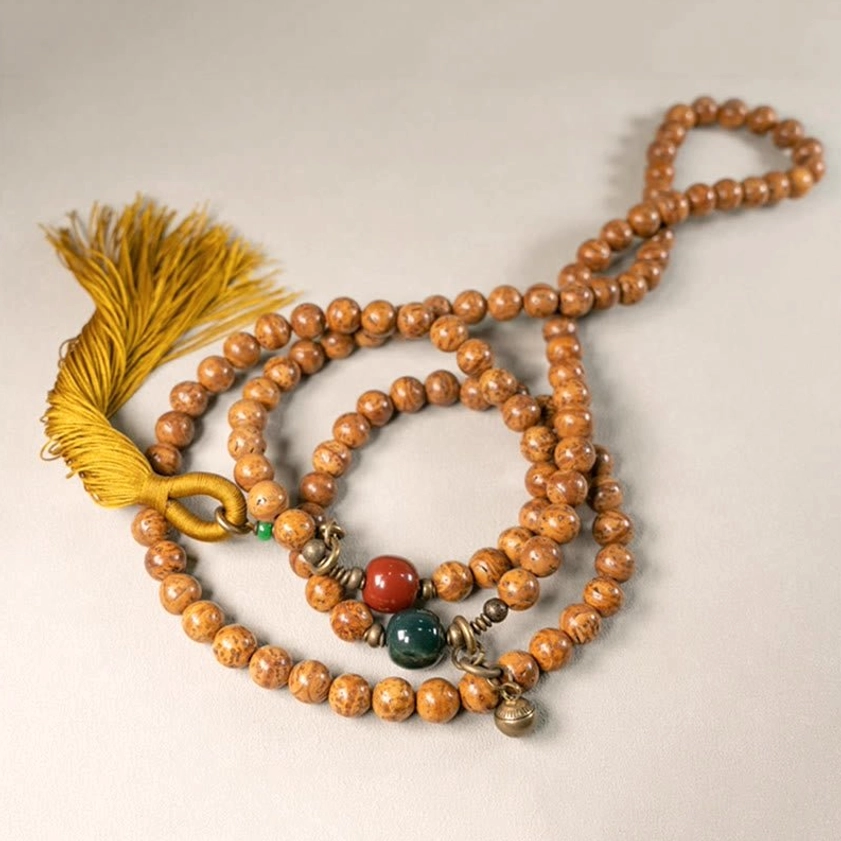 Complete 108 bodhi seed mala beads set coiled flat with yellow tassel and spiritual accessories