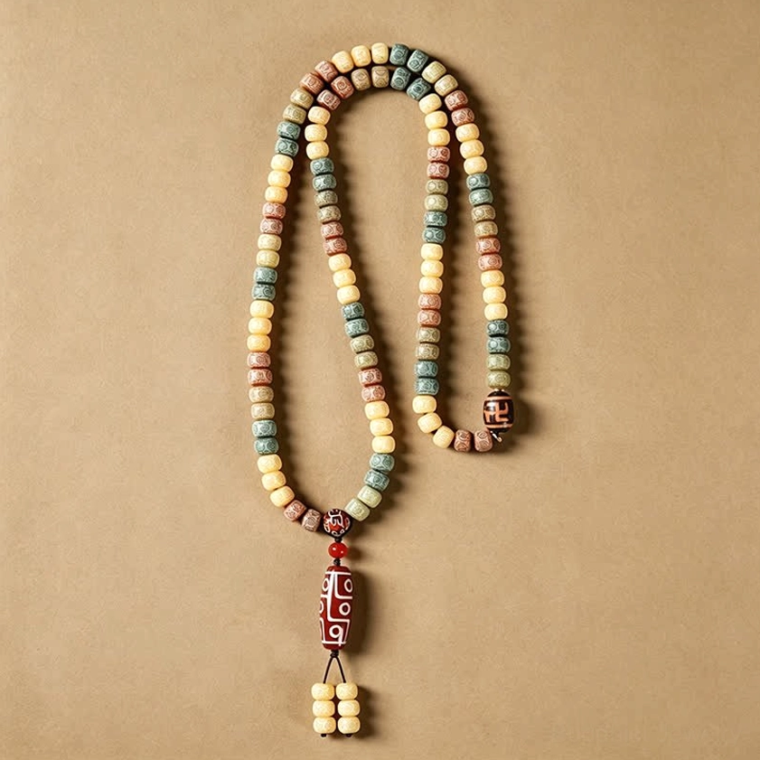 Bodhi seed 108 mala necklace hanging - vertical view with dzi pendant