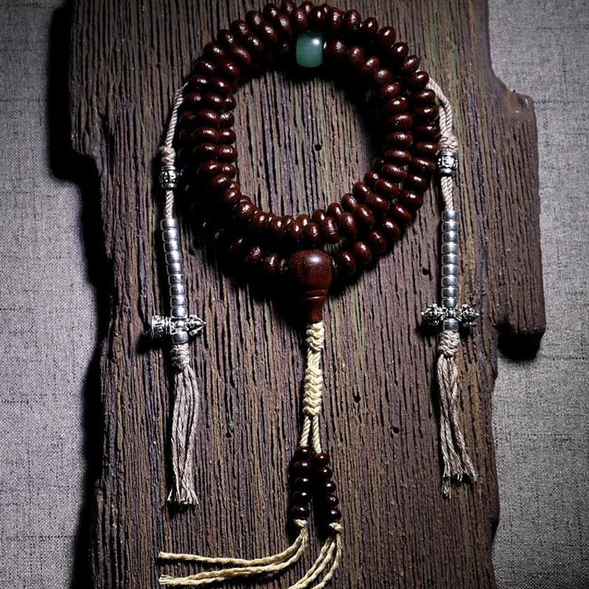 Purple bodhi seed mala with copper dorje charm for spiritual practice and protection