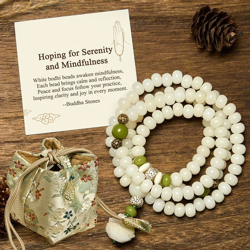 Bodhi lotus mala with embroidered gift bag, smaller 6x8mm bead size variant overhead flat lay