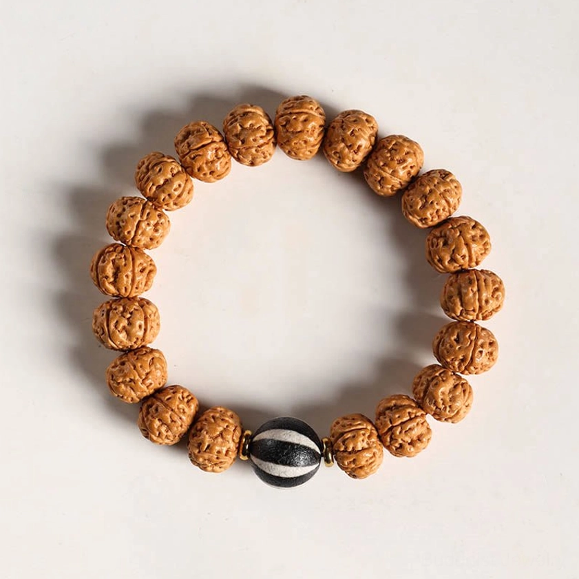Bodhi seed Buddhist prayer bracelet with three-eye Dzi bead and Buddha hand charm for meditation practice