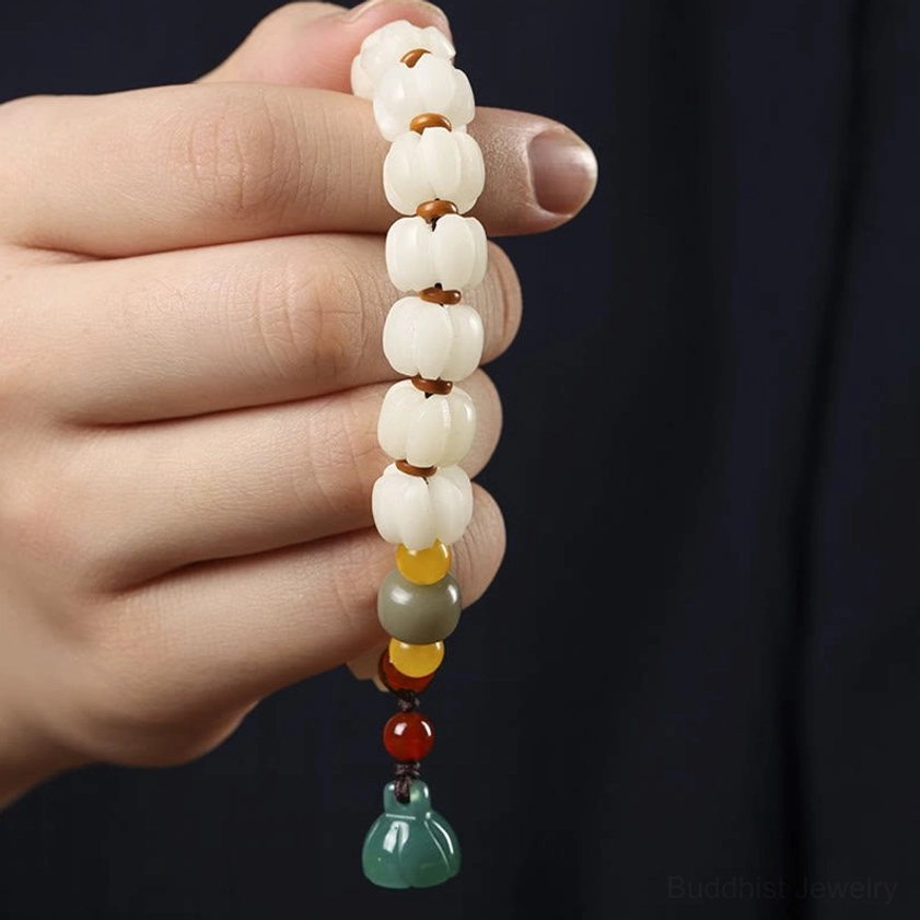 Handcrafted bodhi seed red agate bracelet front view highlighting bead quality and pendant