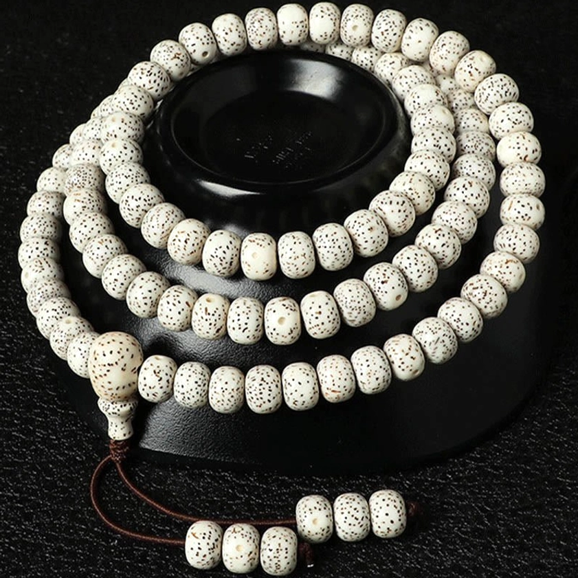 Bodhi seed mala bracelet with amber agate showing detailed craftsmanship and natural material quality