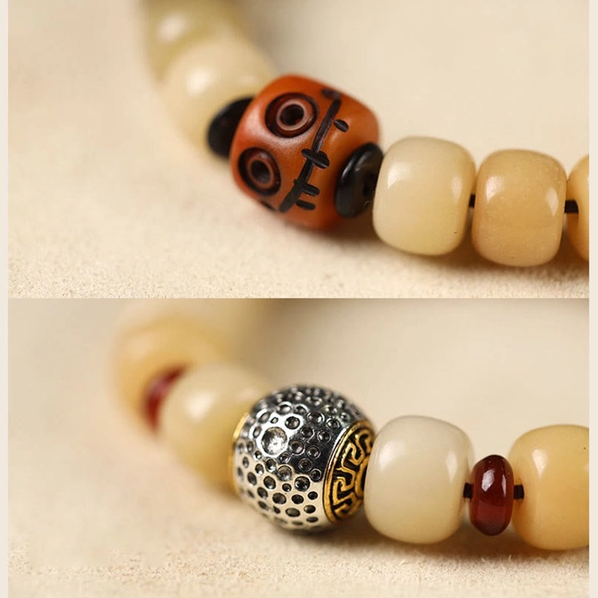 Bodhi seed beaded bracelet with blessing beads accent, earthy gradient wooden beads, handmade Buddhist prayer jewelry flat lay on neutral surface
