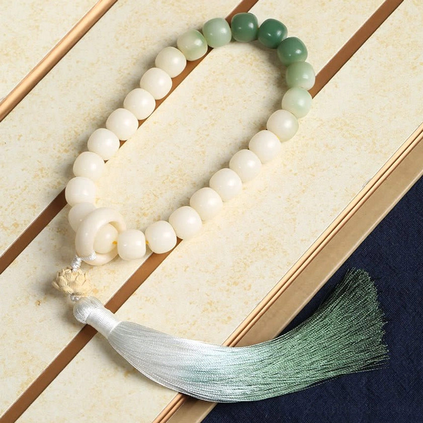 Bodhi seed mala with boxwood and lotus charm - handmade Buddhist wrist bracelet featuring ombre beads and gradient silk tassel for spiritual practice