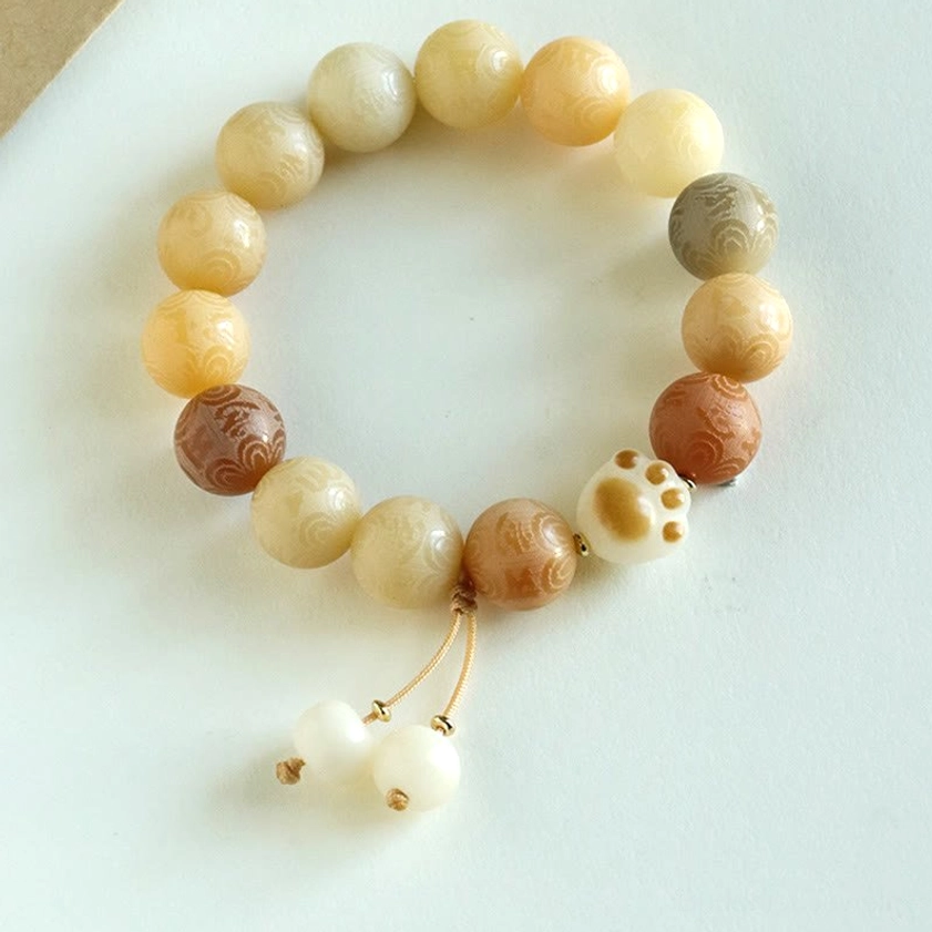 Bodhi Seed Buddhist bracelet with all color variations arranged showing green, yellow, purple, and white options