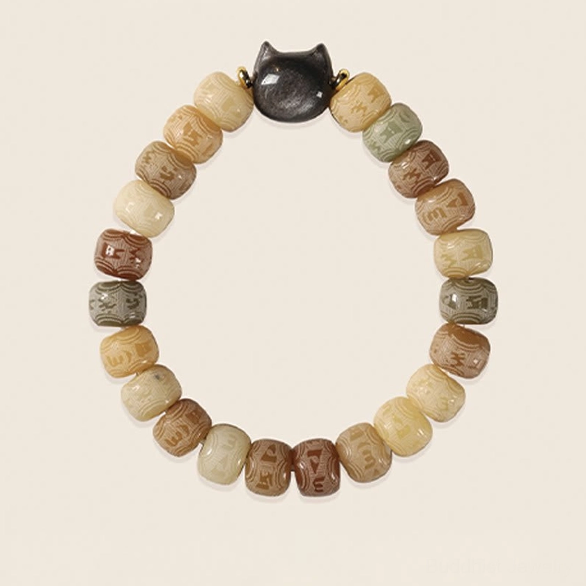 Complete full circle view of bodhi seed bracelet with all carved mantra beads and protective cat head charm