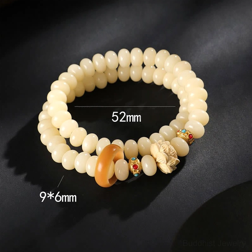 Bodhi seed bracelet size specifications - close-up showing 9x6mm bead size and 52mm inner circumference measurements