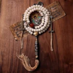 Buddhist 108 prayer mala with bodhi seed and hand-painted three-eye Dzi bead, silver cross tassel pendant, authentic meditation necklace