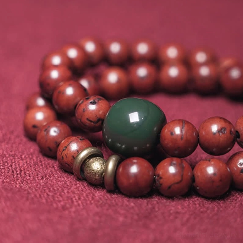 Macro close-up of bodhi seed and cyan jade bracelet showing detailed bead texture and craftsmanship