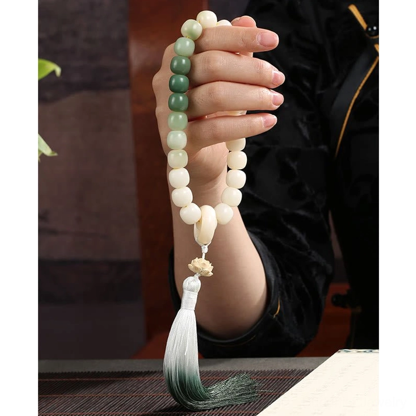 Bodhi seed wrist mala with flowing gradient silk tassel and lotus wisdom pendant - handmade Buddhist meditation bracelet for spiritual practice