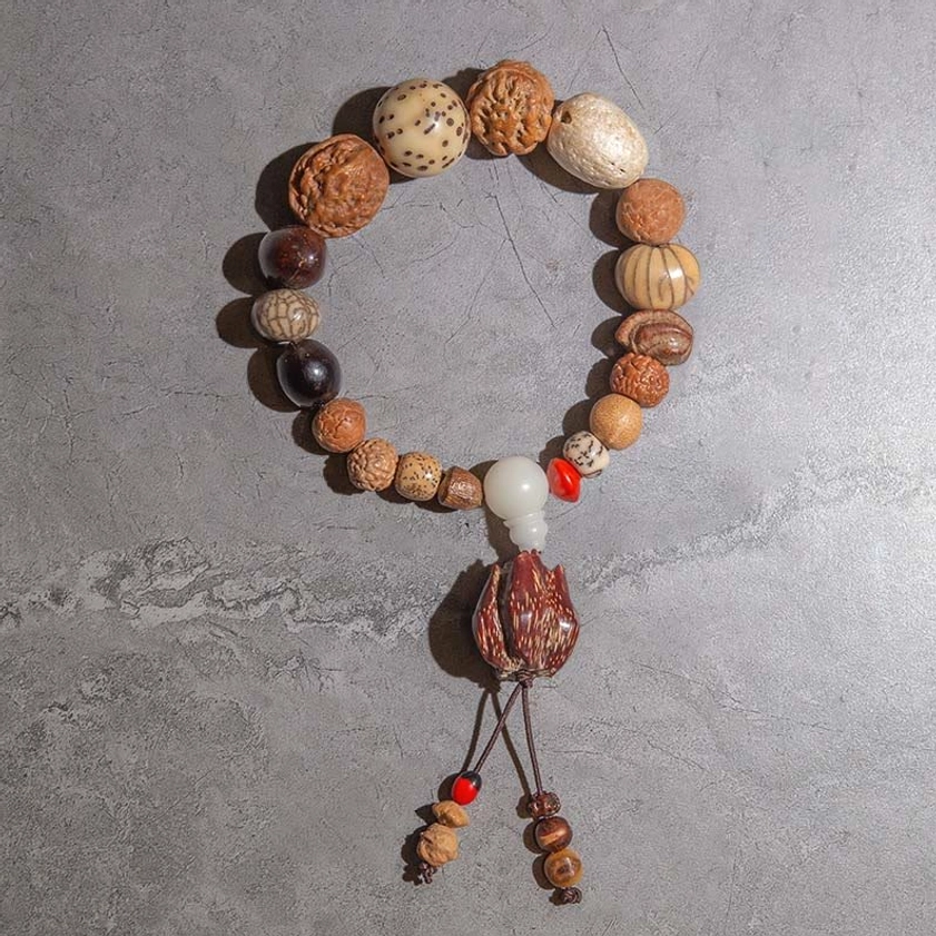 Single-loop bodhi seed prayer bracelet with mixed natural seed beads white spacer and tassel pendant with red accents