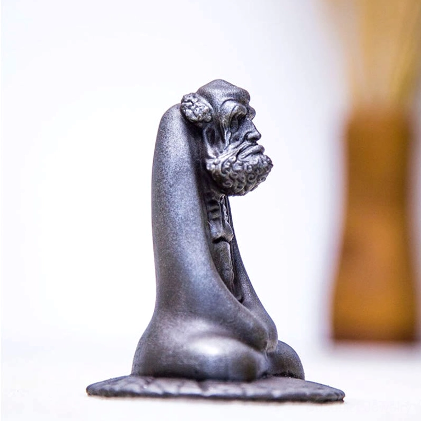 Bodhidharma iron powder statue fine details showing craftsmanship and hand-sculpted elements