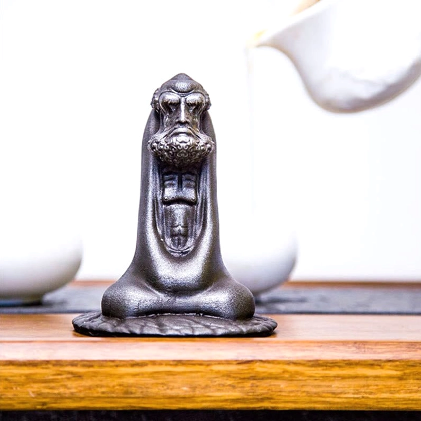 Bodhidharma resin sculpture complete view with lotus base and carved artistic details