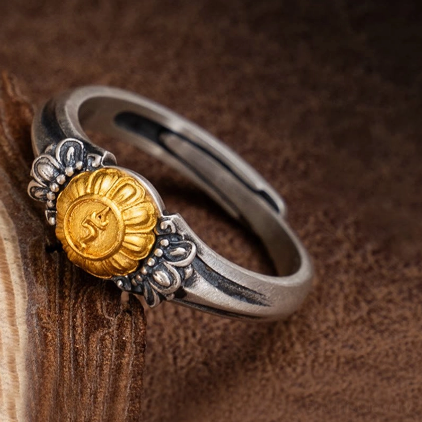 Bodhisattva Tara sterling silver protection ring with gold-plated emblem, side close-up view showing vintage texture and craftsmanship