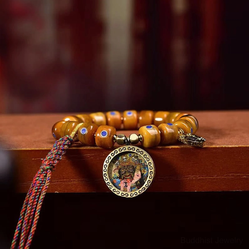 Bone bead bracelet with lazurite stones showing natural material variations and craftsmanship quality