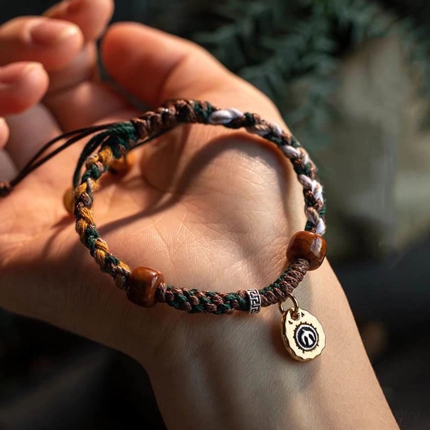 Premium handcrafted Buddhist bone bead bracelet featuring natural materials, 18K gold-plated accents, and spiritual protection design