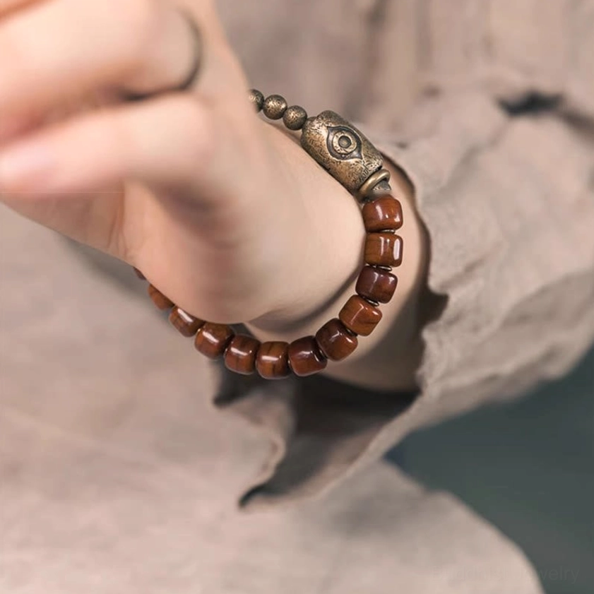 Multiple size options of bone beads Dzi eye Buddhist bracelets showing adjustable wrist circumference for different fits