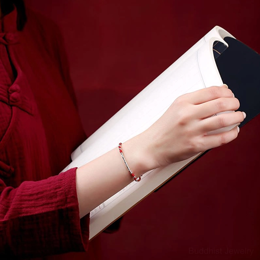 Handmade Buddhist protection bracelet worn on wrist showing daily wear comfort