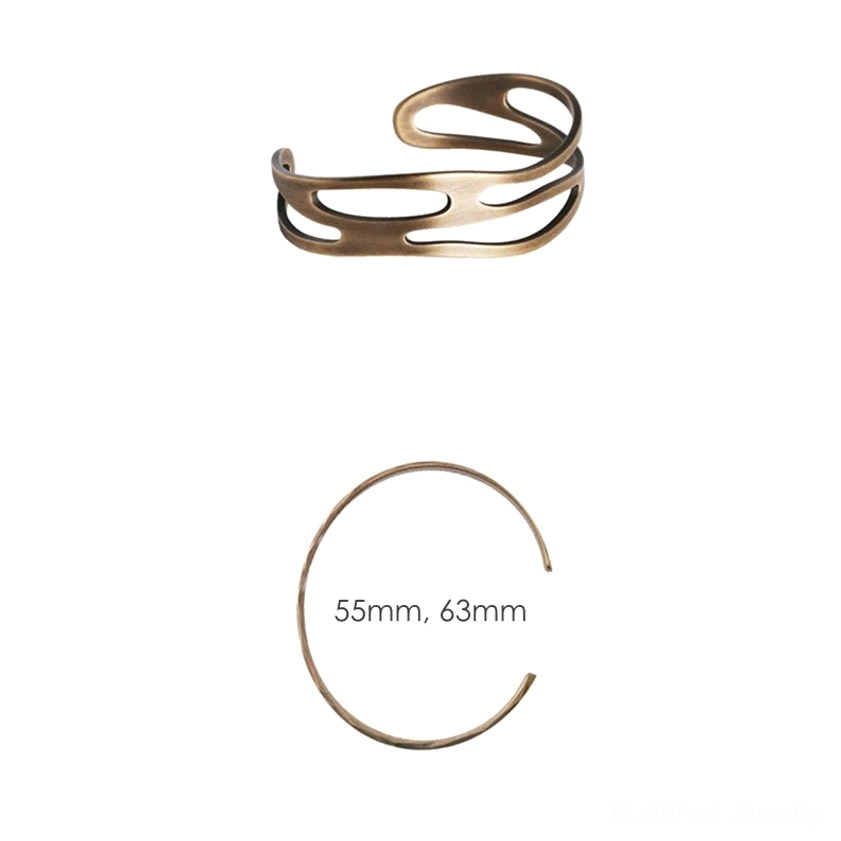 Brass Buddhist wealth bangle adjustable open cuff bracelet showing authentic handcrafted metalwork and eco-friendly natural materials