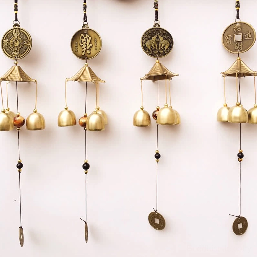 Handmade brass wind chime bell with elephant, Bagua, blessing letter and auspicious coin symbols for protection and good fortune