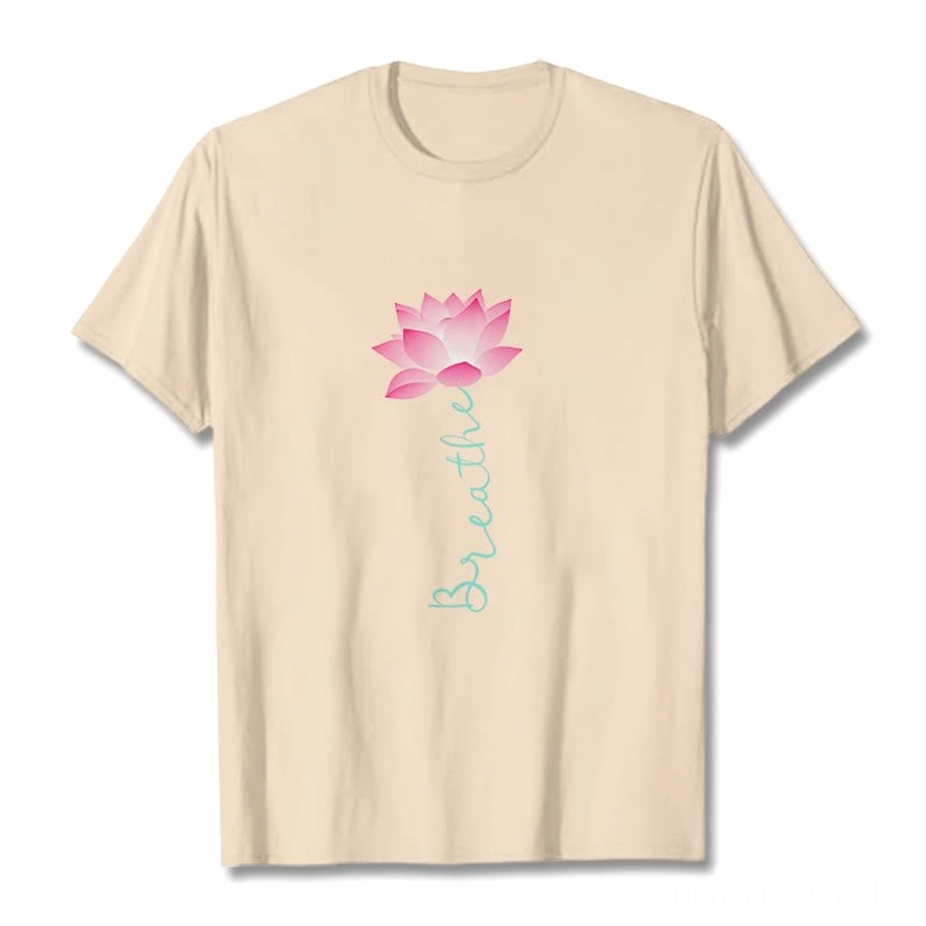 Beige breathe lotus graphic tee flat lay front view with lotus design