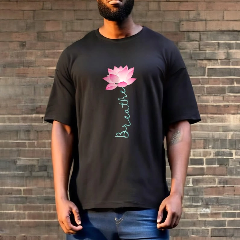 Man wearing black breathe lotus Buddhist tee with blue jeans outdoor brick wall