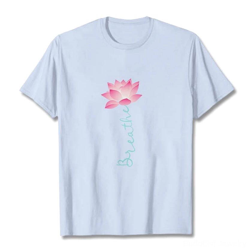Light cyan breathe lotus graphic tee shirt flat lay showing color and design