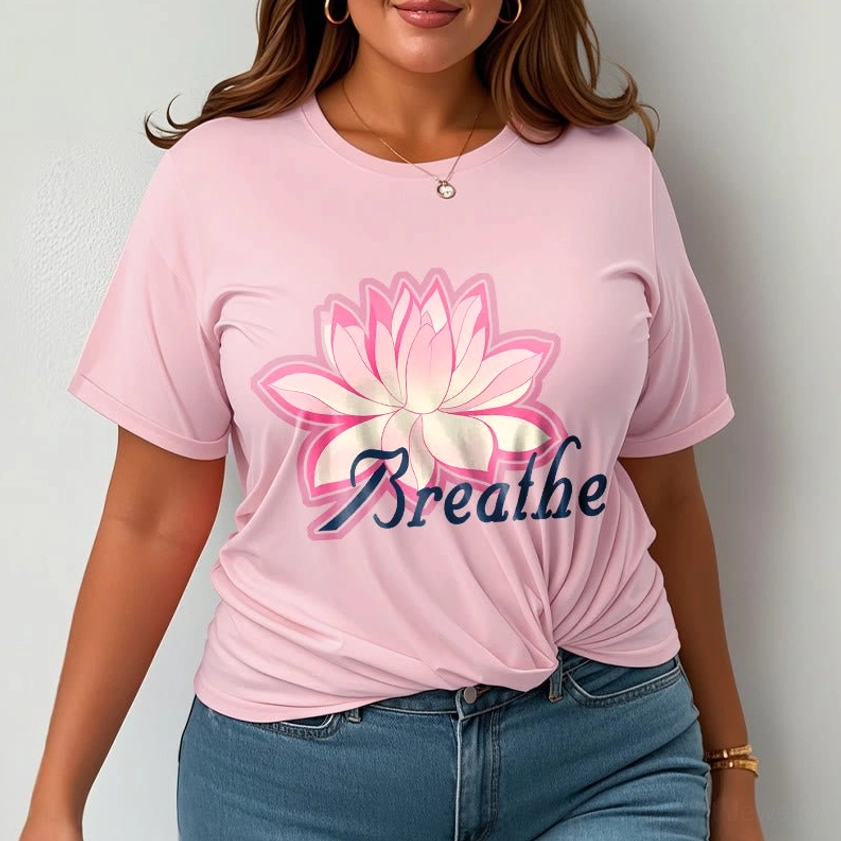 Woman wearing breathe lotus flower light gray unisex t-shirt with pink lotus design, everyday casual styling