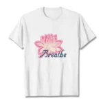 Breathe lotus flower white t-shirt flat lay front view with pink lotus graphic and dark blue text print