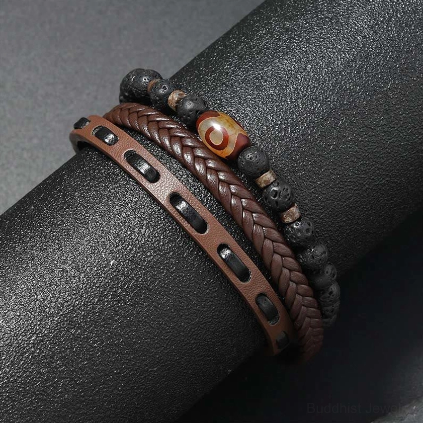 Brown leather braided dzi bead bracelet side view with red eye detail