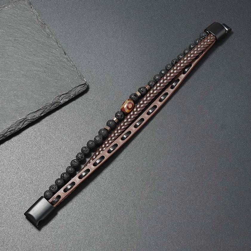 Full length brown leather braided nine-eye dzi bead bracelet flat lay