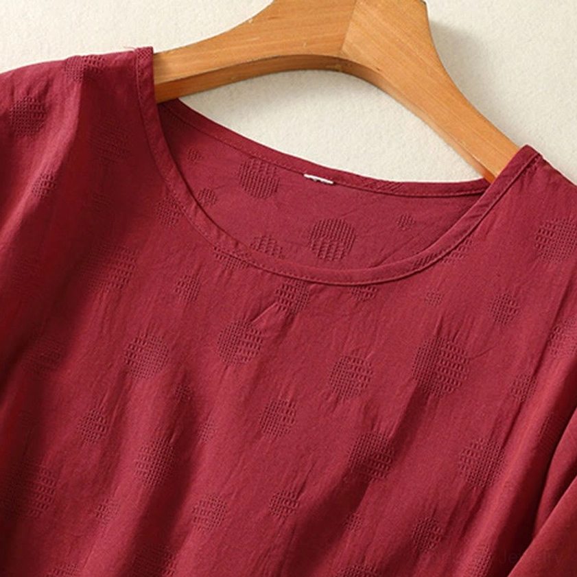 Sleeve detail of brown meditation yoga blouse - close-up showing puffed sleeve and cotton texture