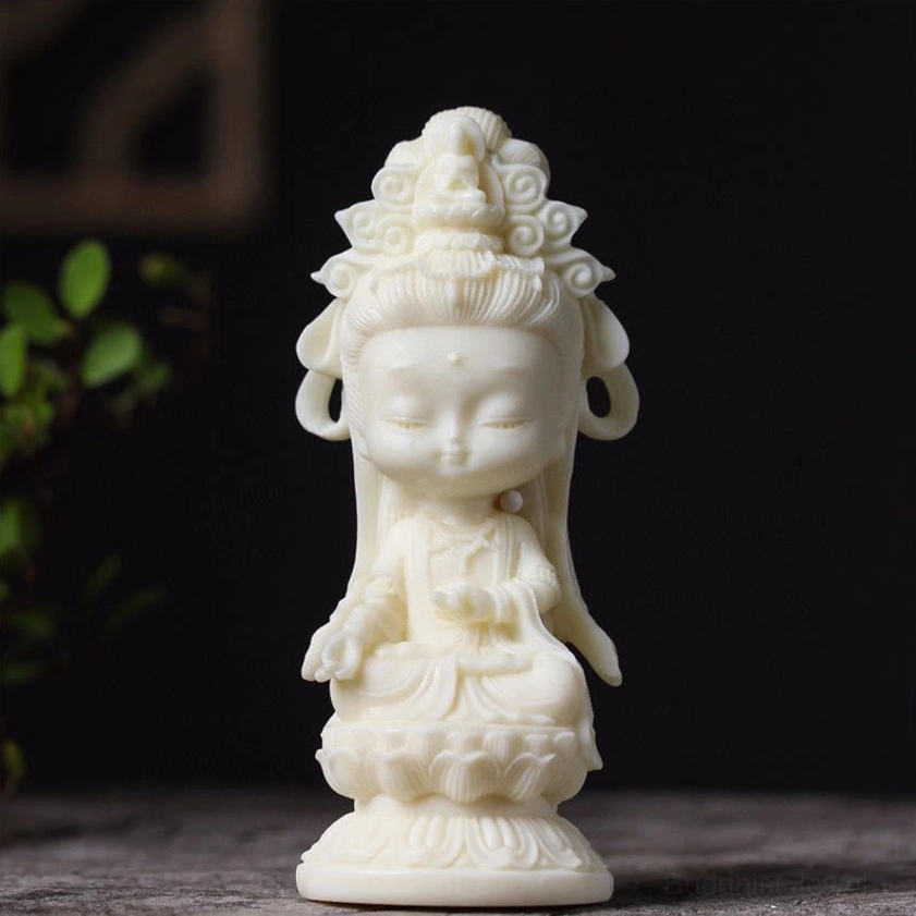 Avalokitesvara Buddha statue direct front view, showing ornate carved headpiece and traditional meditation hand posture on lotus base