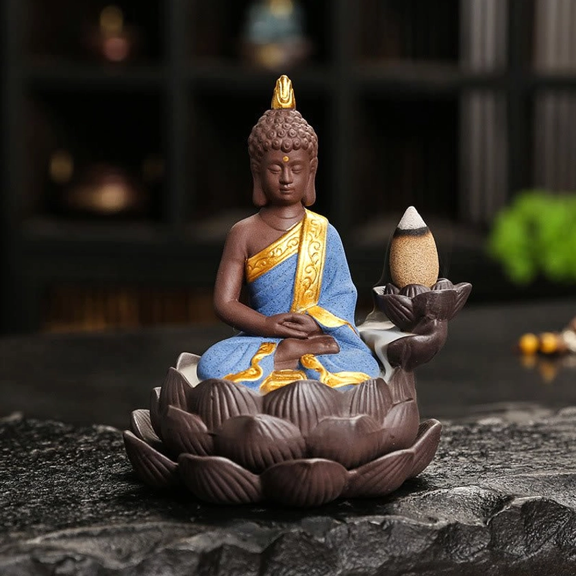 Blue Buddha backflow incense burner with meditation hand pose and ceramic glazed finish in frontal view