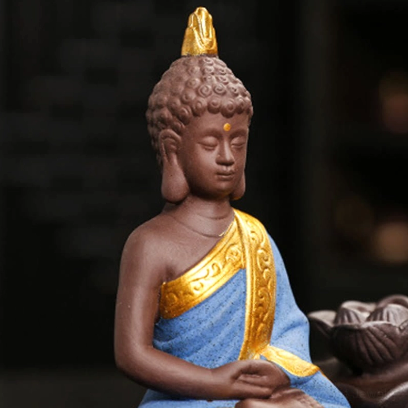 Blue Buddha backflow incense burner in pondering gesture pose showing hand-painted ceramic artistry detail