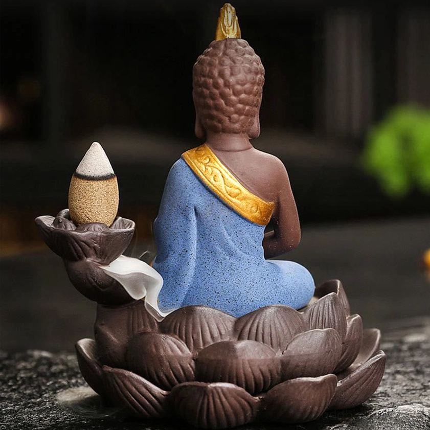 Blue ceramic Buddha burner with prayer blessing mudra expressing gratitude and spiritual devotion