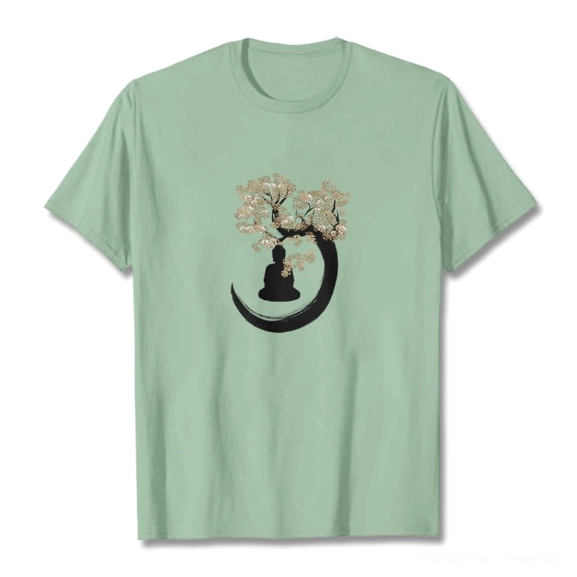 Pale green Buddha tree t-shirt front view flat lay with black and gold spiritual print design