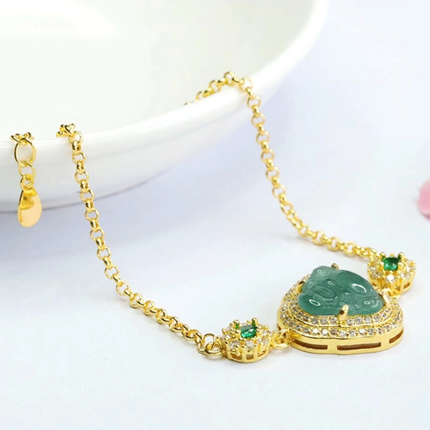 Handmade green jade Laughing Buddha bracelet showing chain extender and symmetrical zircon stone decorations