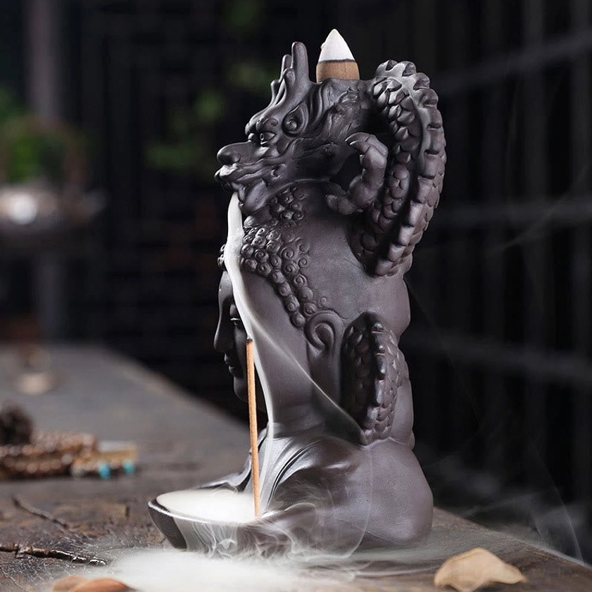 Buddha dragon incense burner left profile showing Buddha face and coiled dragon detail