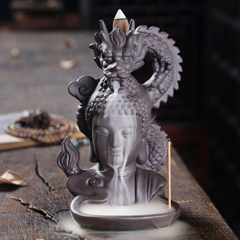 Buddha dragon backflow incense burner overhead view with mala prayer beads and stick incense