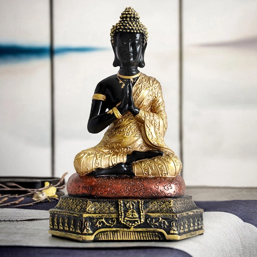 Buddhist figure statue displaying traditional enlightenment pose and serene spiritual energy