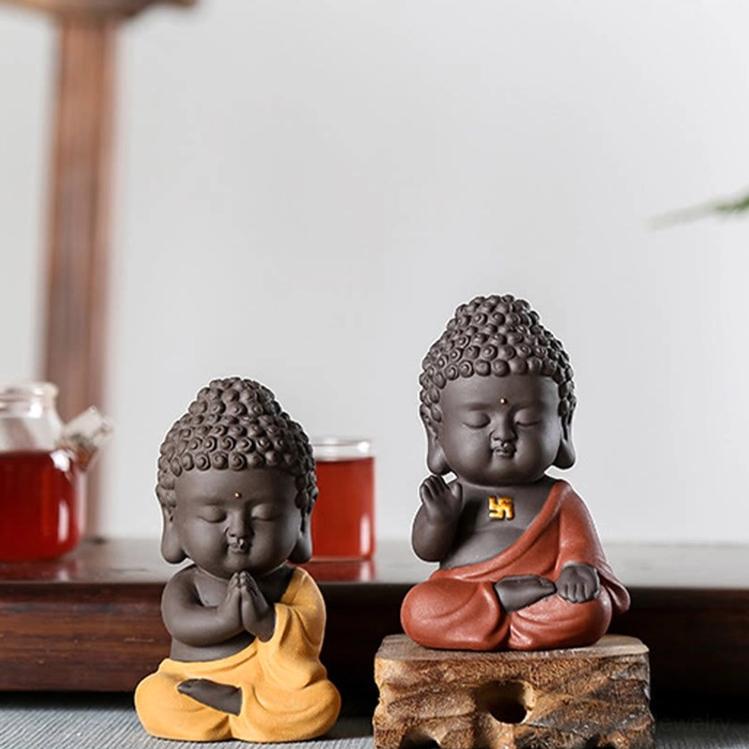 Buddha figurine in natural purple clay material, authentic handmade craftsmanship showing traditional Buddhist artistic elements